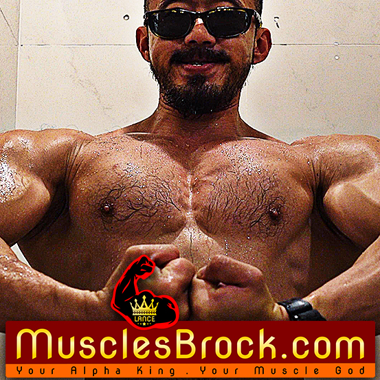 MusclesBrock flexing his muscular physique in sunglasses with the MusclesBrock.com logo.